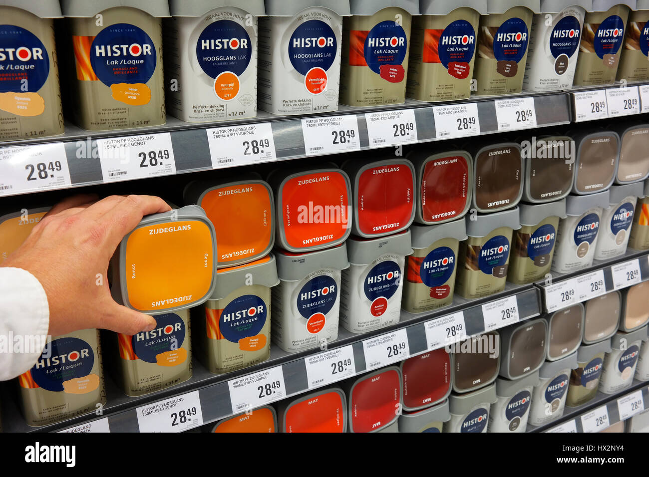 Range of paint cans in the paint department of a Hardware store Stock