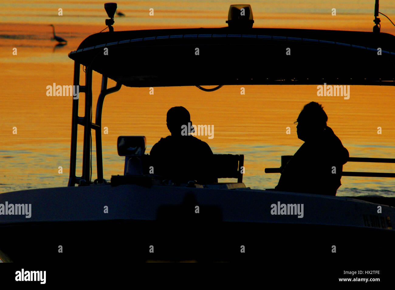 Boat on the ocean silhouette hi-res stock photography and images - Alamy