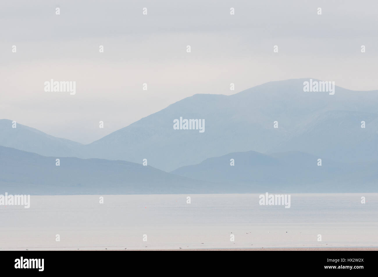 The shell beach at Applecross, Scotland looking across the sea to the ...