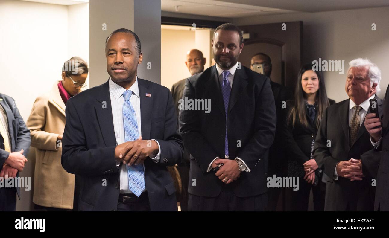 U.S. Secretary of Housing and Urban Development Ben Carson, left, during a tour of the Charlotte Apartments March 17, 2017 in Detroit, Michigan. Stock Photo