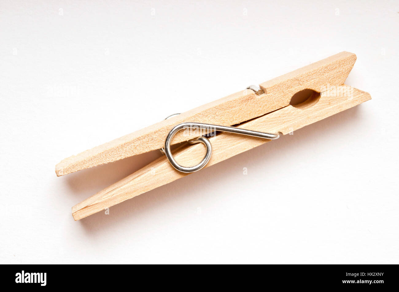 wooden clothes peg isolated Stock Photo