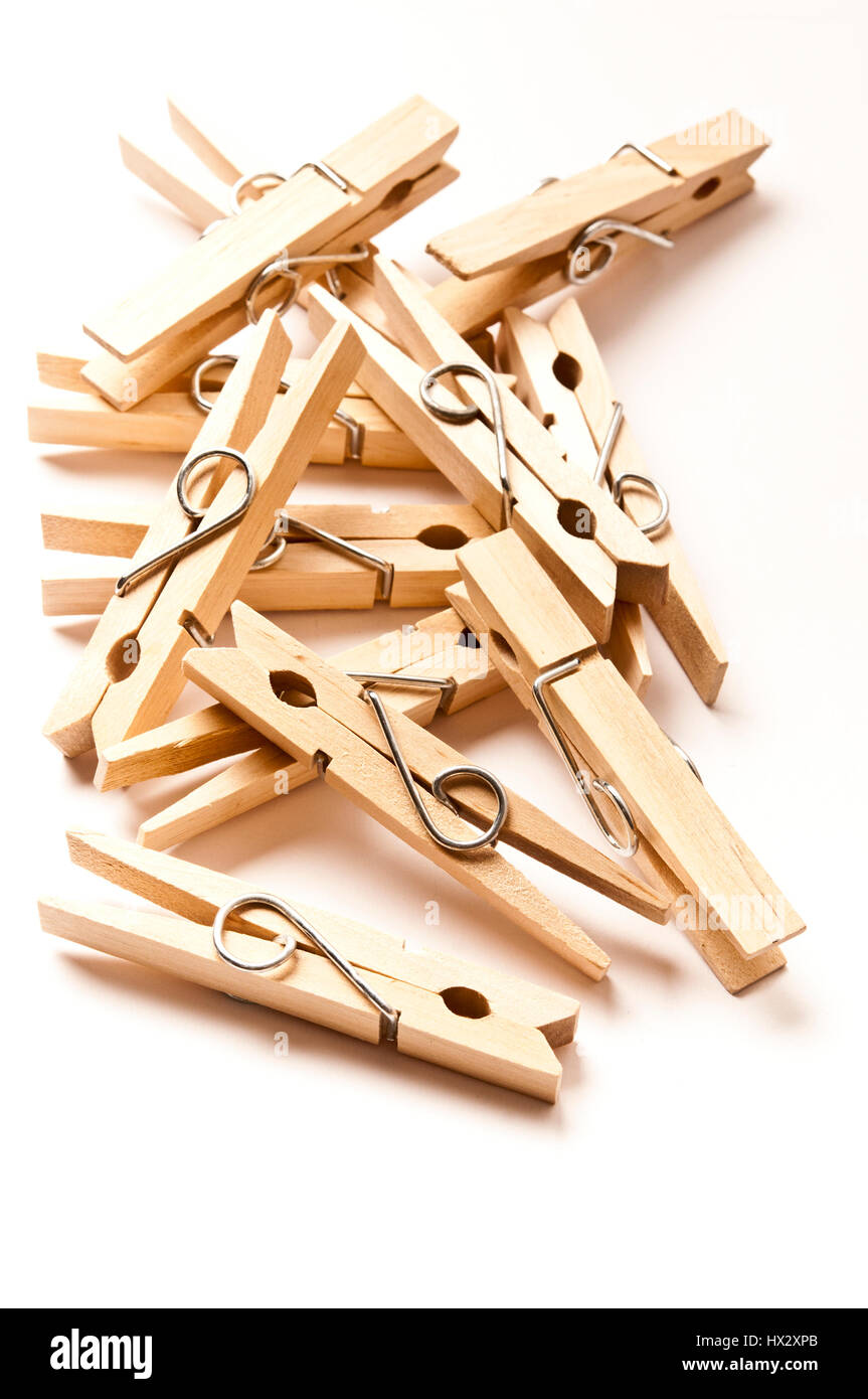 wooden clothes pegs isolated Stock Photo Alamy
