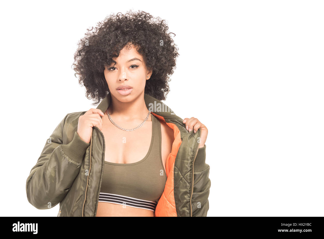 Teenage model with urban fashion clothes isolated on a white background