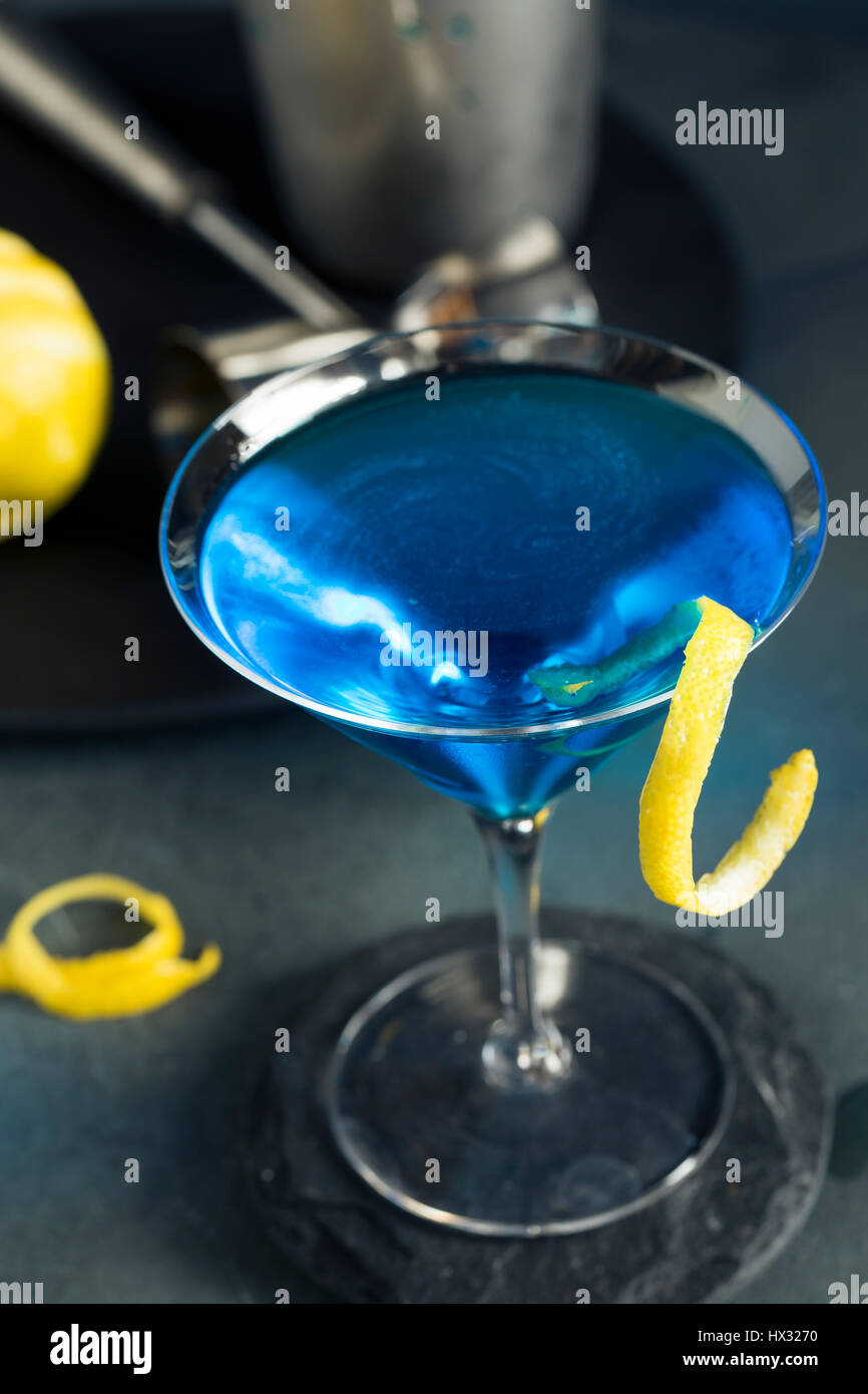 Refreshing Blue Martini Cocktail with Lemon Garnish Stock Photo