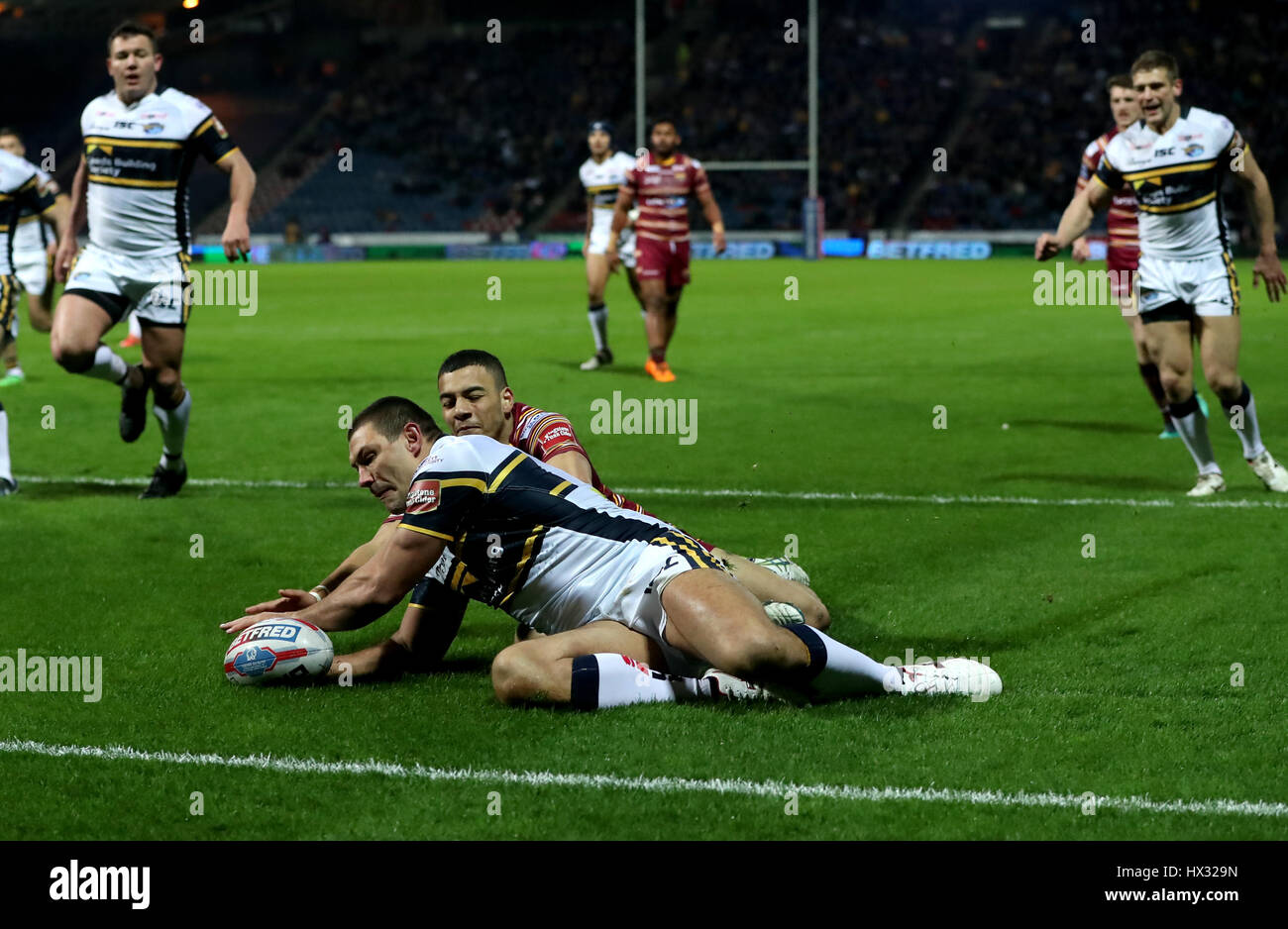Leeds Rhinos' Ryan Hall dives in to score his side's second try of the game during the Betfred Super League match at the John Smith's Stadium, Huddersfield. Stock Photo