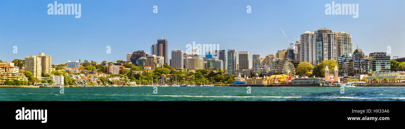 Panorama of North Sydney central business district with Lavender Bay and Luna Park Stock Photo
