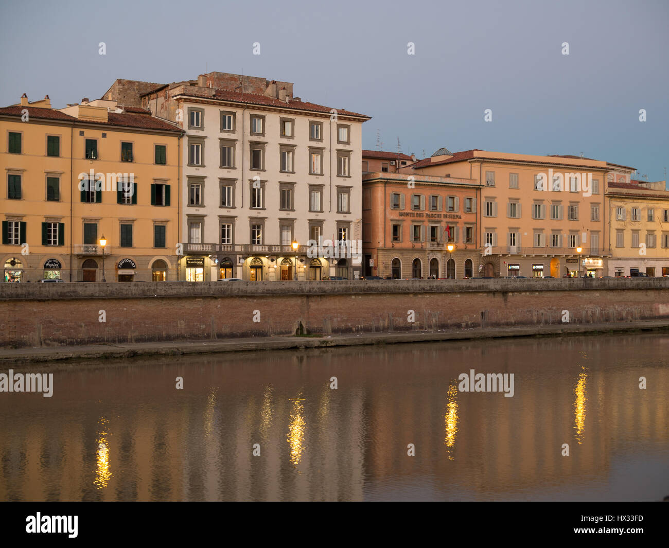 Pisa building reflected in Arno River Stock Photo