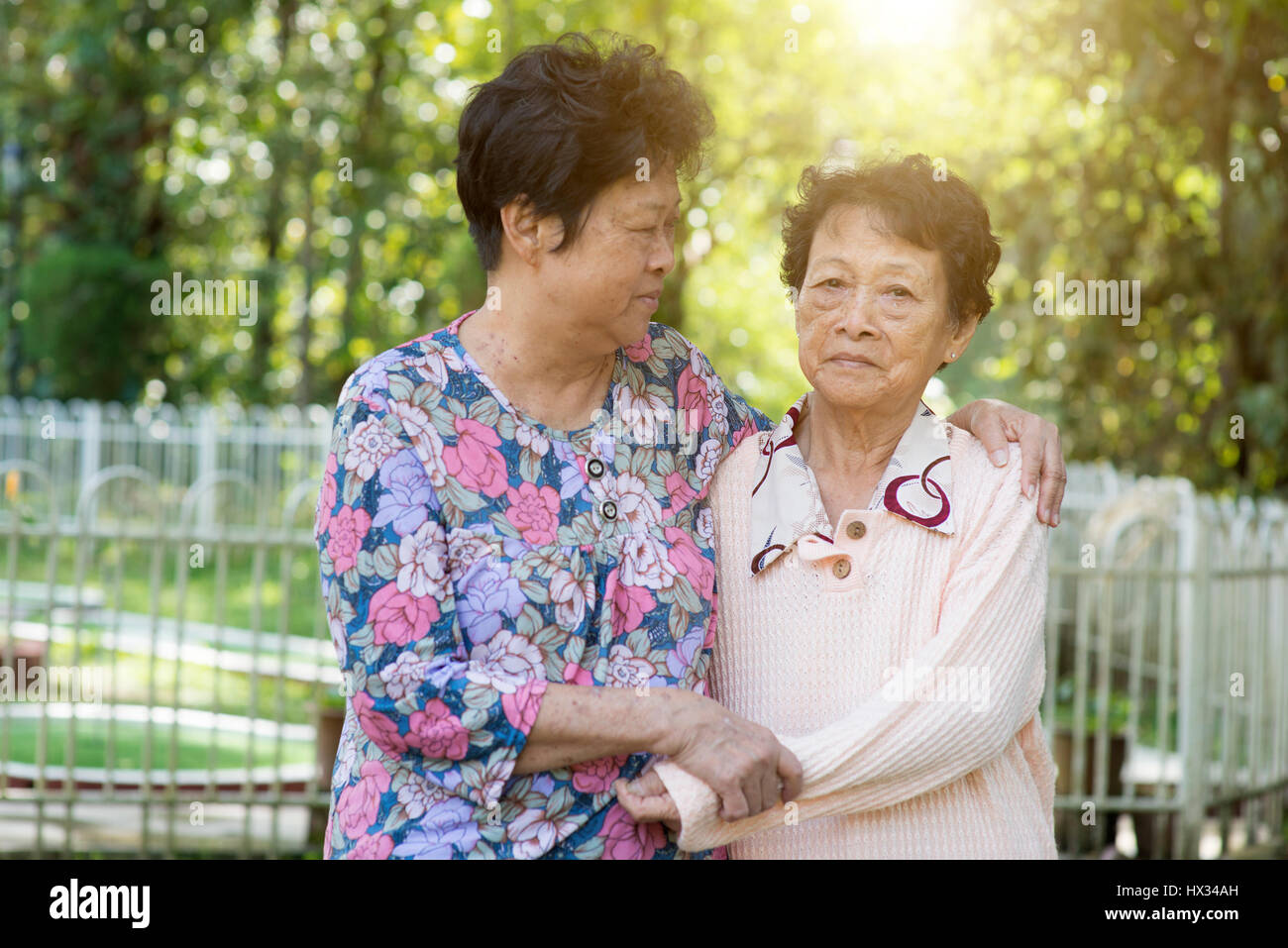 Candid shot of Asian elderly women at outdoor park in the morning Stock ...