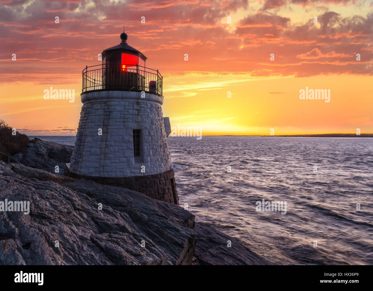 Castle hill Lighthouse in orange sunset Stock Photo