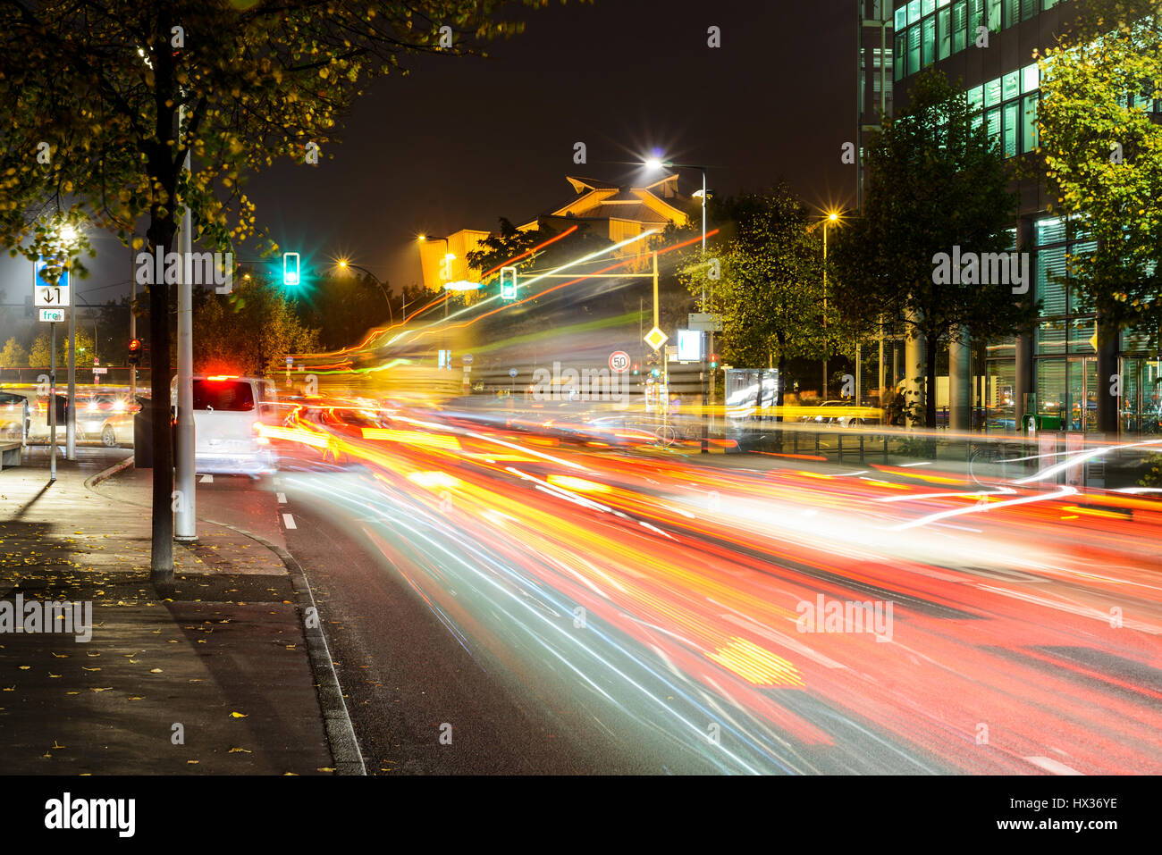 Berlin city lights at night. Road traffic at a traffic light crossing. Berlin, Germany Stock Photo