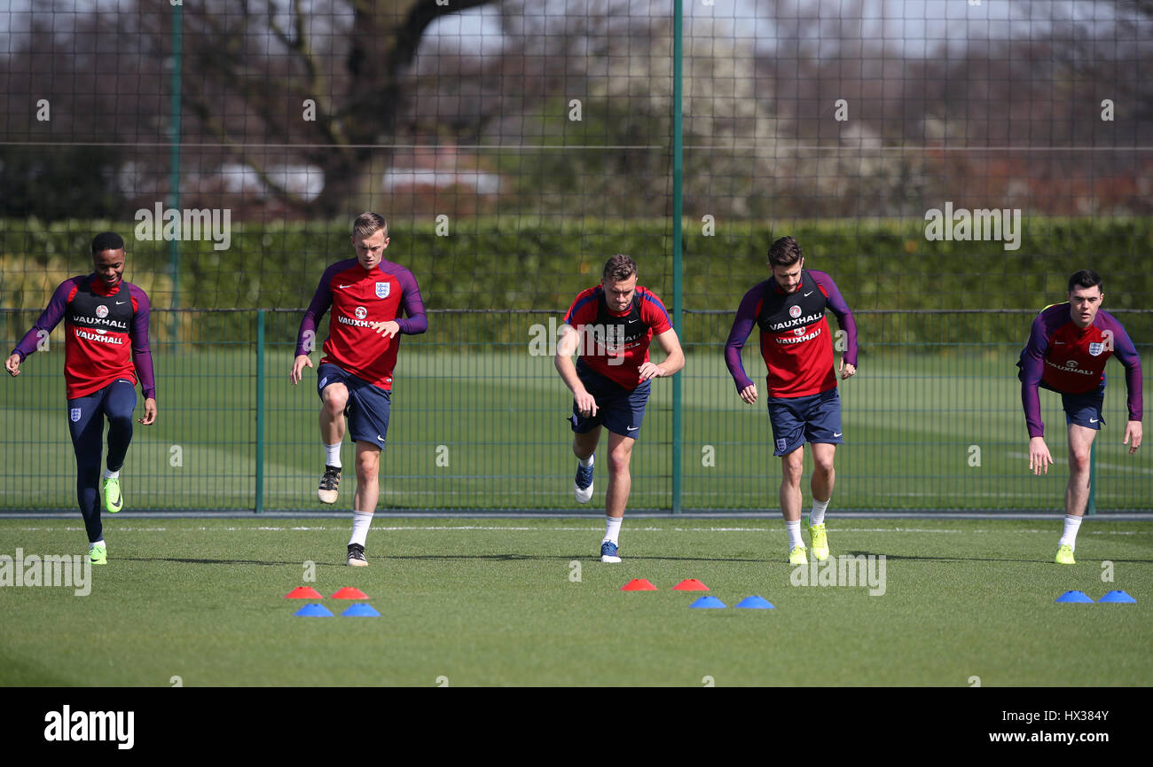 England's (from left to right) Raheem Sterling, James Ward-Prowse, Ben Gibson, Adam Lallana and Michael Keane during the training session at Enfield Training Ground, London. Stock Photo