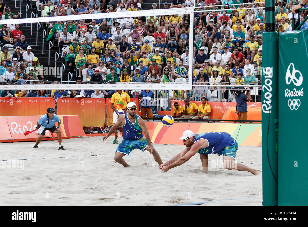 Rio de Janeiro, Brazil. 15 August 2016 Alison Cerutti – Bruno Schmidt (BRA) vs  Phil Dalhausser – Nick Lucena (USA) compete in the Beach Volleyball qu Stock Photo