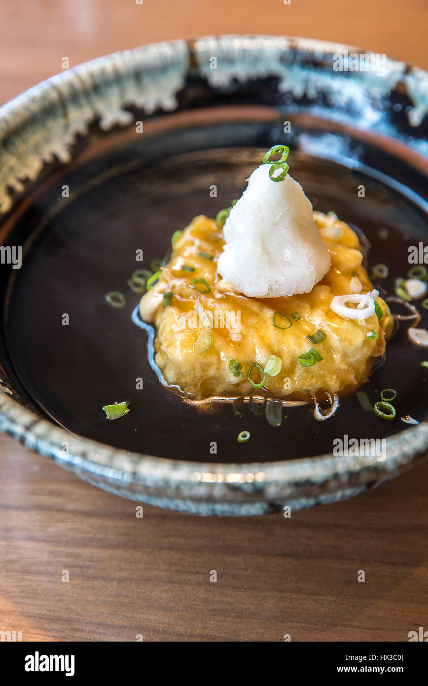 baked homemade tofu in gravy sauce Stock Photo Alamy