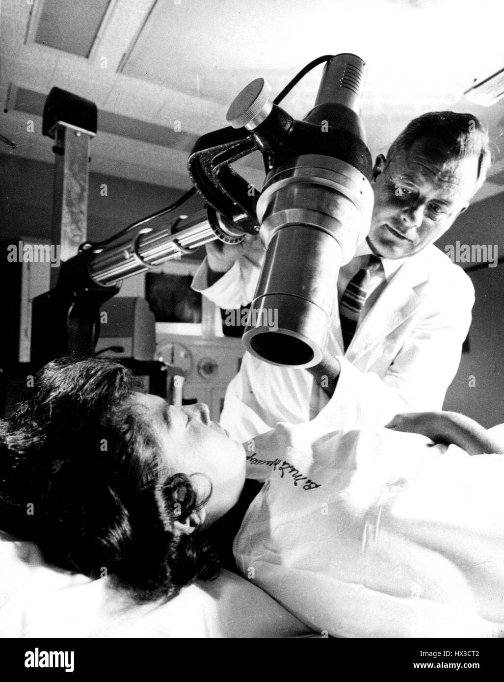 Measurement of the uptake of radioactive iodine in the thyroid gland of a patient, 1965. Image courtesy US Department of Energy. Stock Photo