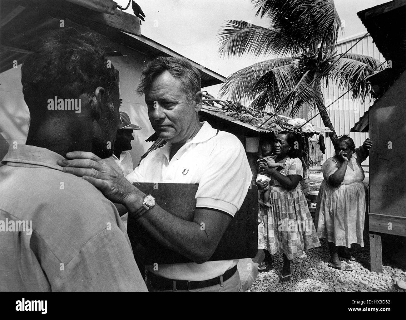 Medical team conducting annual medical examinations of Marshallese people who were exposed to radioactive fallout from an atmospheric nuclear weapons test in 1954, image courtesy US Department of Energy, 1954. Stock Photo