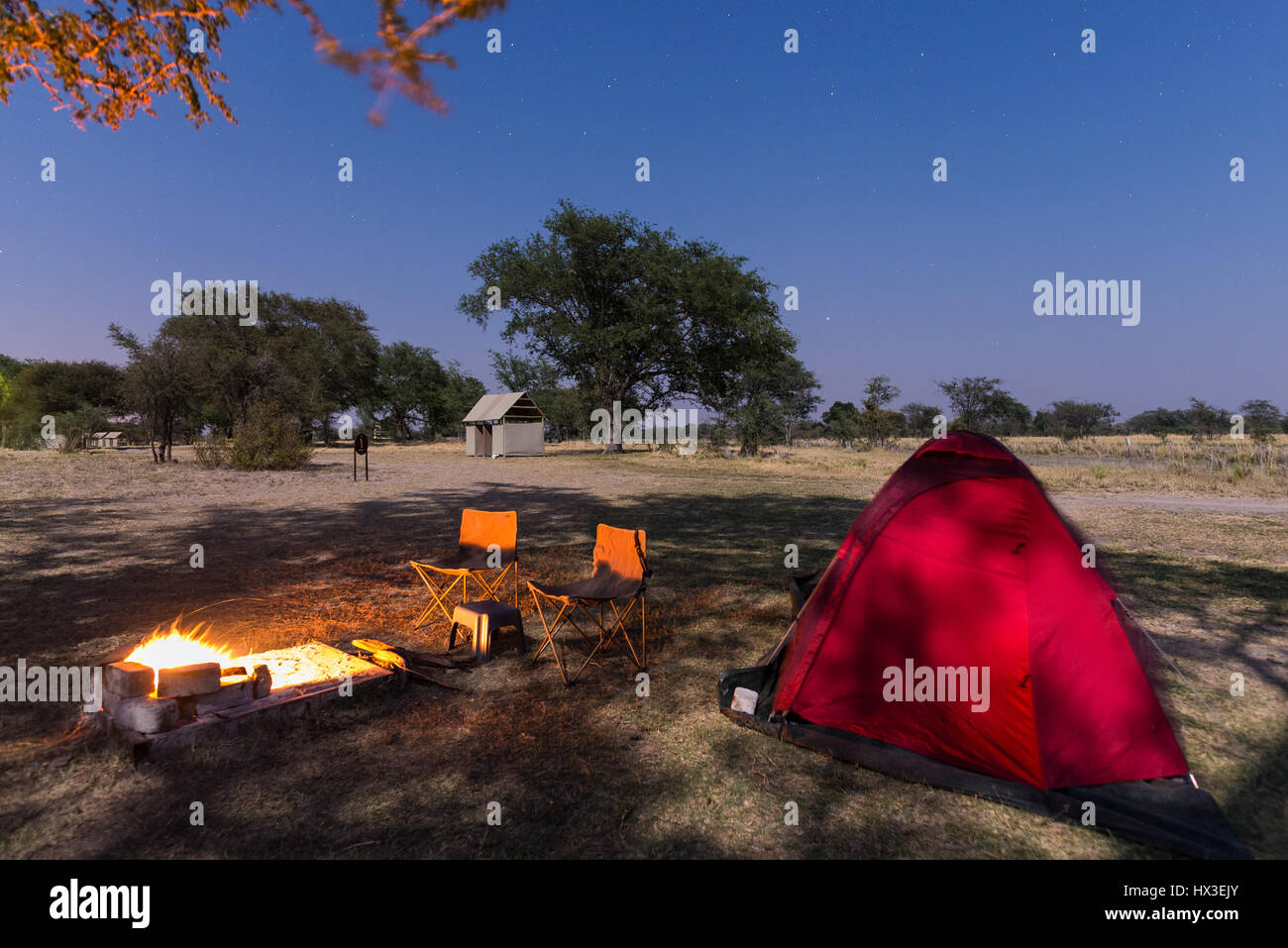 Camping site with starry sky by night 