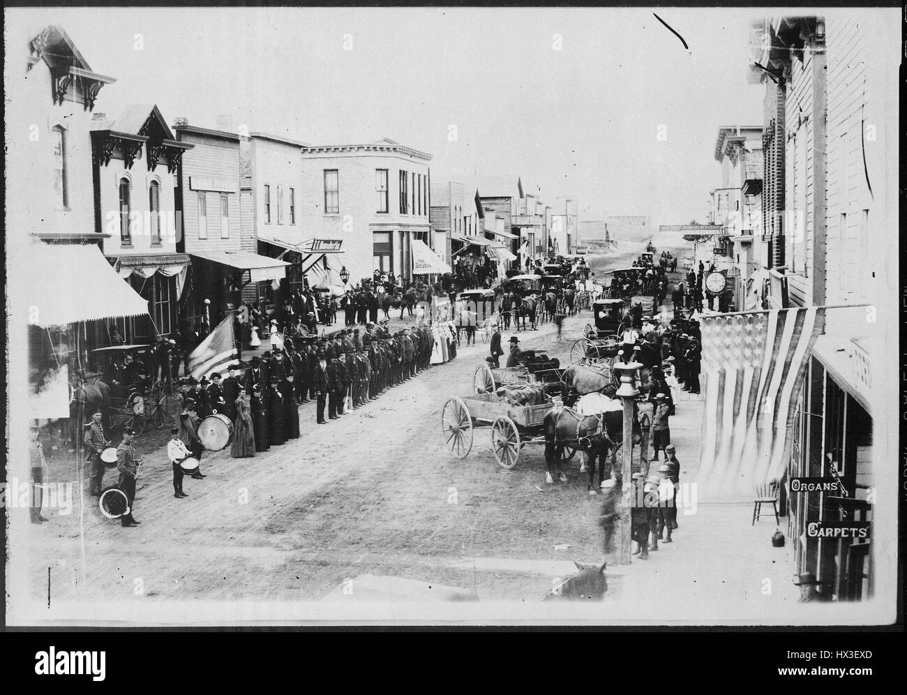 Civil War veterans during Fourth of July or Decoration Day on review in the center of town, Ortonville, Minnesota, 1880. Image courtesy National Archives. Stock Photo