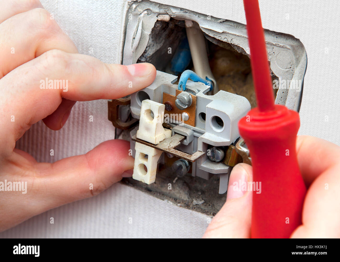 Removal and replacement of the old, faulty wall switch light Stock