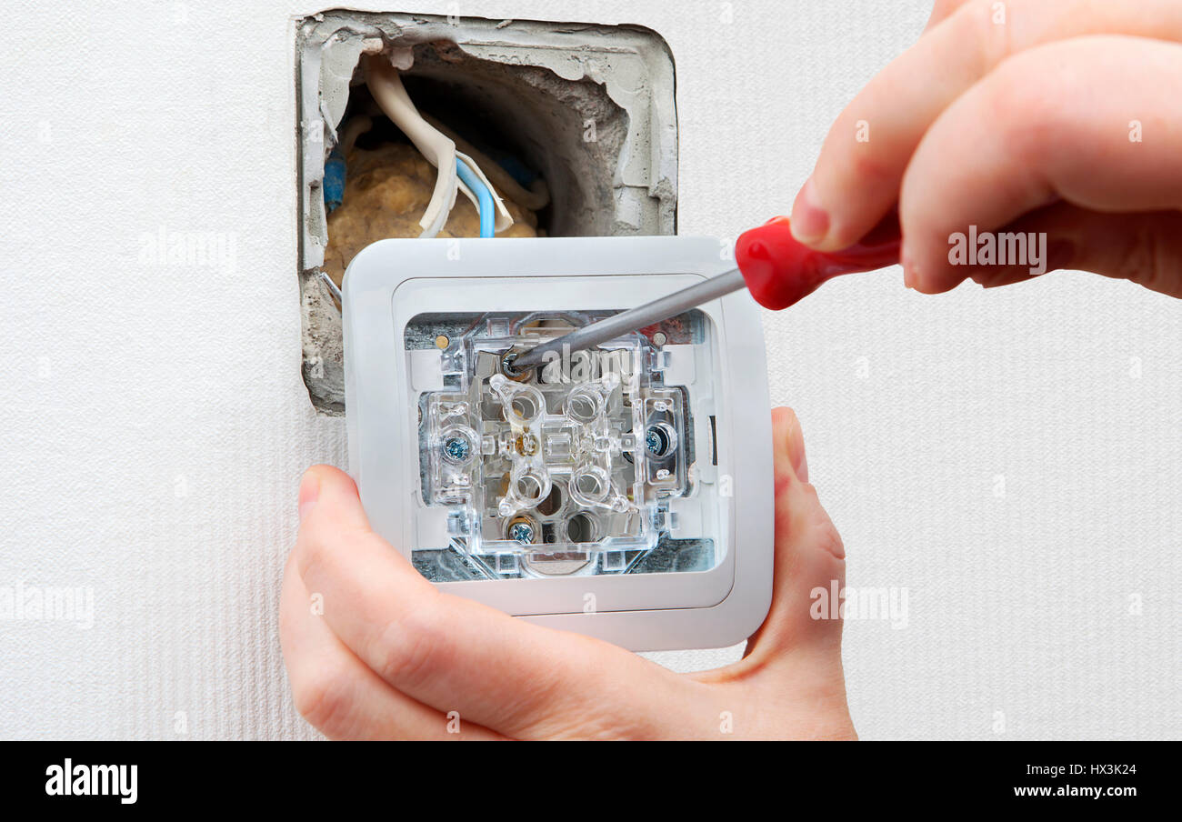 Change light switch, mounted light electrical switches, connect wires from house wirin Stock