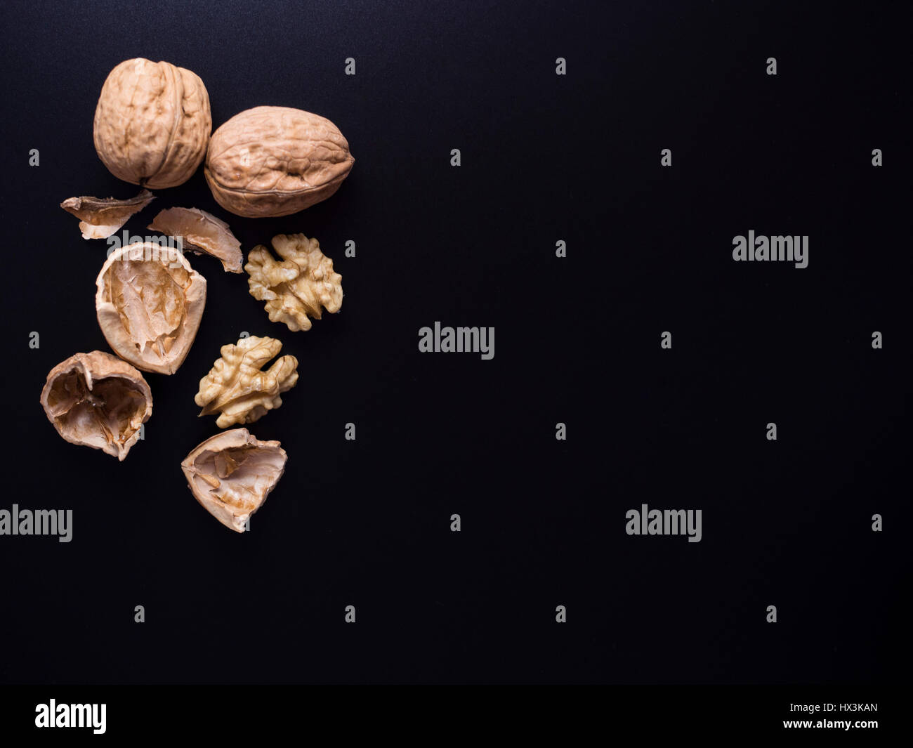 Diffrence Between Shell And Kernel Walnut shell and kernel isolated on black background Stock Photo - Alamy