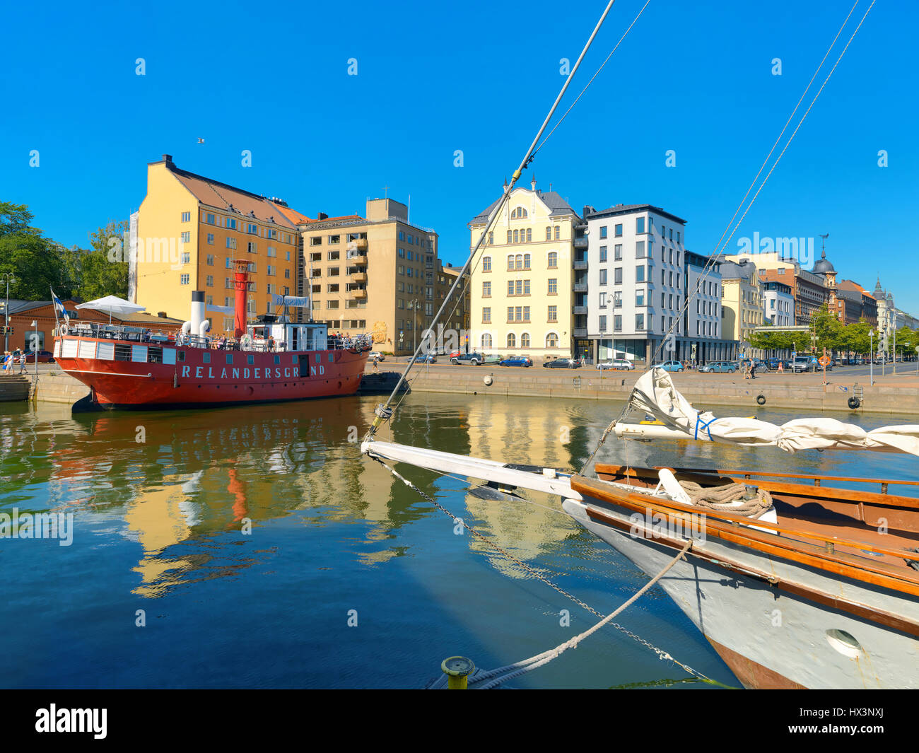 Apartment buildings and pier with famous restaurant Relandersgrund lightship. Helsinki, Finland, Scandinavia Stock Photo