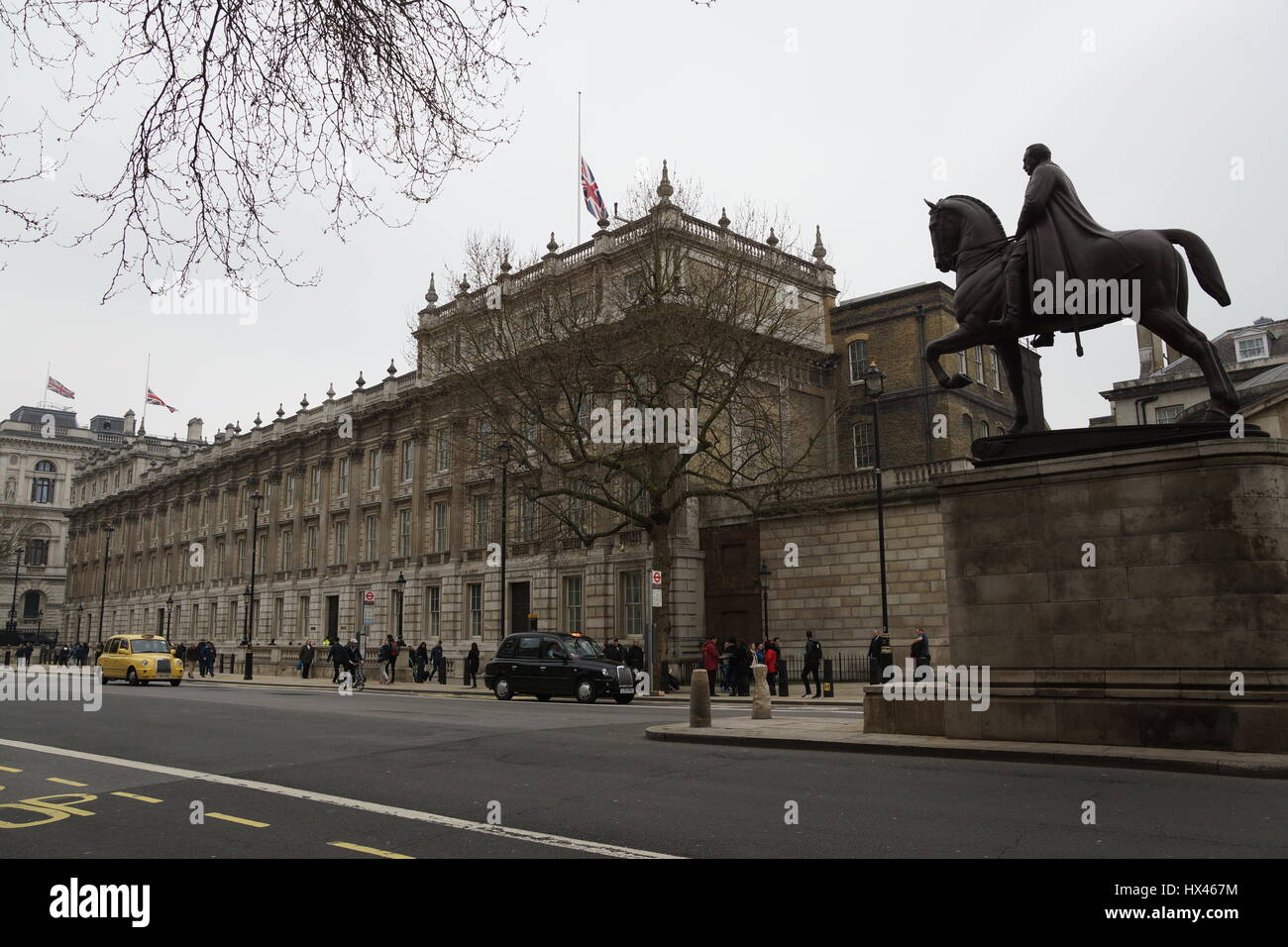London, UK. 23rd Mar, 2017. The scene in Whitehall where flags fly at half mast in the wake of the murder of PC Keith Palmer by Khalid Massood, also known as Adrian Elms, also known as Adrian Russell Ajao on Wednesday 21 March 2017. Credit: Peter Hogan/Alamy Live News Stock Photo