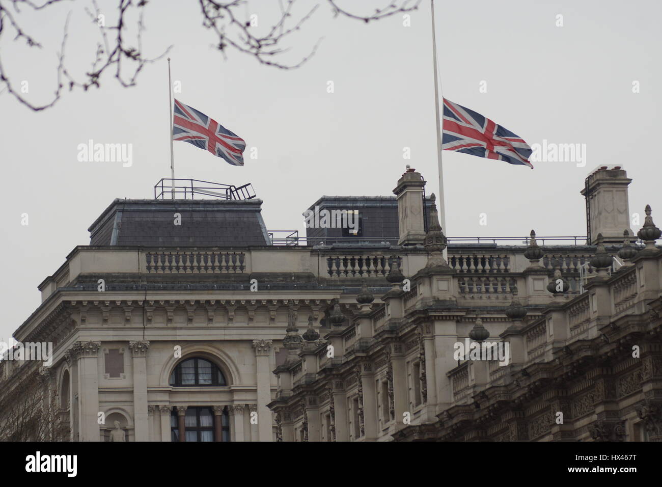 London, UK. 23rd Mar, 2017. The scene in Whitehall where flags fly at half mast in the wake of the murder of PC Keith Palmer by Khalid Massood, also known as Adrian Elms, also known as Adrian Russell Ajao on Wednesday 21 March 2017. Credit: Peter Hogan/Alamy Live News Stock Photo