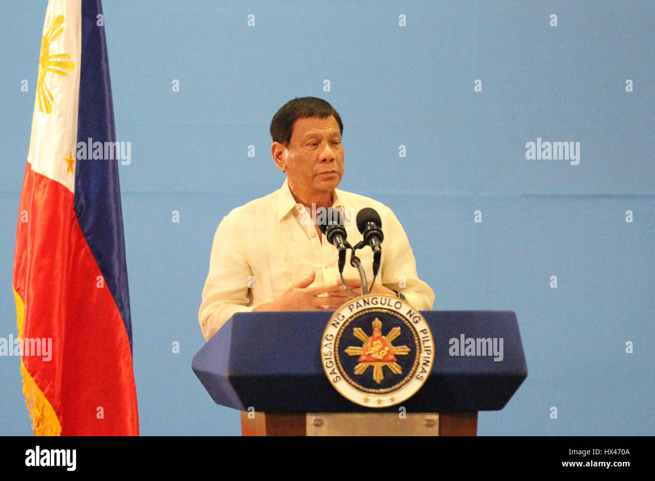 Manila, Philippines. 24th Mar, 2017. Philippine President Rodrigo Duterte speaks at a meeting of the Federation of Filipino-Chinese Chambers of Commerce and Industry (FFCCCII) in Manila, the Philippines, March 24, 2017. Philippine President Rodrigo Duterte said Friday that he is looking forward to his second trip to China this May to attend the 'One Belt, One Road' summit organized by the Chinese government. Credit: Wang Yu/Xinhua/Alamy Live News Stock Photo