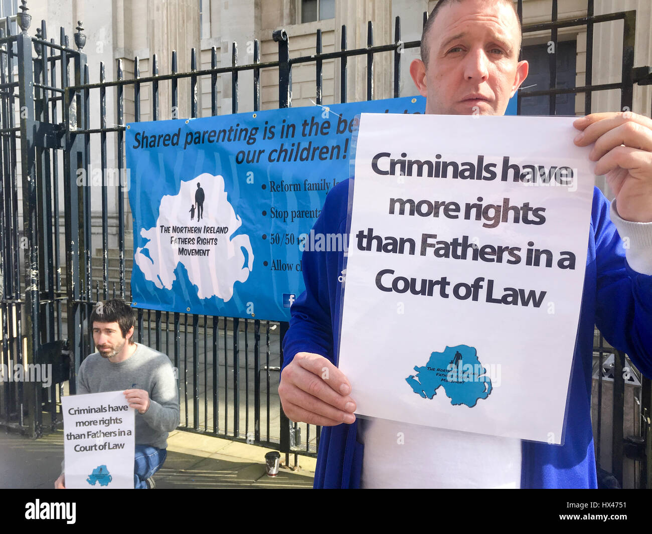 Derry, Northern Ireland. 24th March 2017. The Northern Ireland Fathers' Rights Movement is a movement whose members, both men & women, are primarily interested in issues related to family law and child custody. Today (24th March 2017) they were protesting outside the Courts in Derry, Northern Ireland.  Their aim is to create greater awareness of 50/50 shared parenting following a relationship breakdown, to campaign for reform of Family Law and bring about an end to a system where unsubstantiated allegations can be made against the non resident parent Credit: Darron Mark/Alamy Live News Stock Photo