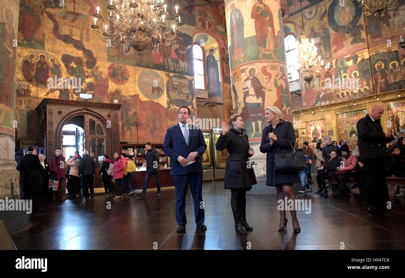 Moscow, Russia. 24th March 2017. Leader of the National Front and French Presidential candidate Marine Le Pen, right, tours the an Orthodox cathedral in the Kremlin with Putin aide Igor Shchegolev, left, prior to meeting with the Russian president March 24, 2017 in Moscow, Russia. Credit: Planetpix/Alamy Live News Stock Photo