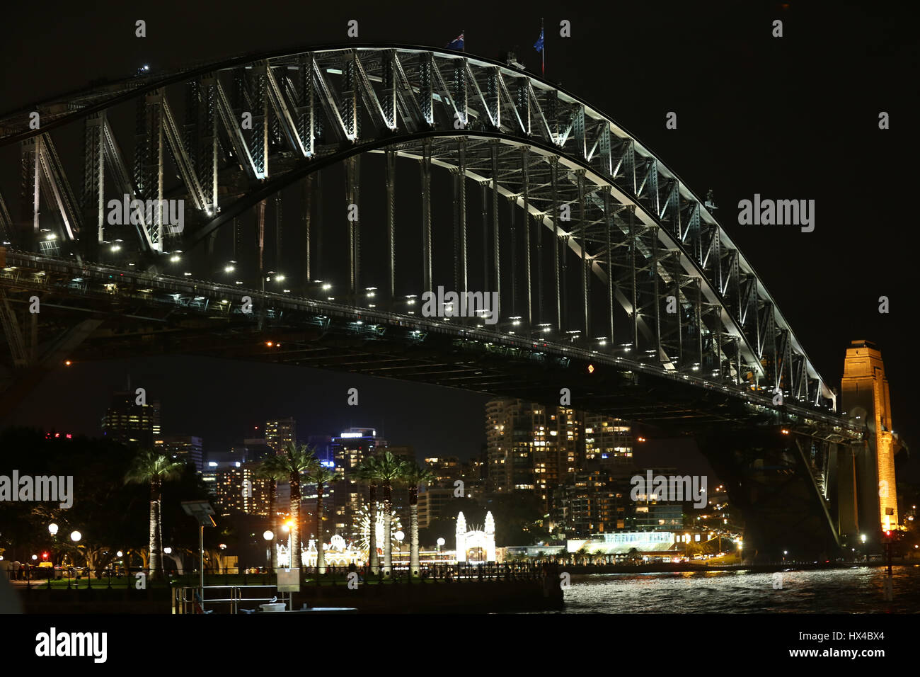 Sydney, Australia. 25 March 2017. The lights of the Sydney Opera House and the Sydney Harbour Bridge were turned off for one hour from 8:30pm to 9:30pm to mark ‘Earth Hour’. Pictured: Sydney Harbour Bridge just before Earth Hour. Credit: © Richard Milnes/Alamy Live News Stock Photo