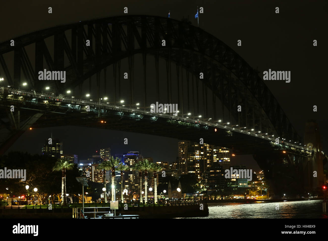 Sydney, Australia. 25 March 2017. The lights of the Sydney Opera House and the Sydney Harbour Bridge were turned off for one hour from 8:30pm to 9:30pm to mark ‘Earth Hour’. Pictured: Sydney Harbour Bridge just after Earth Hour. Credit: © Richard Milnes/Alamy Live News Stock Photo
