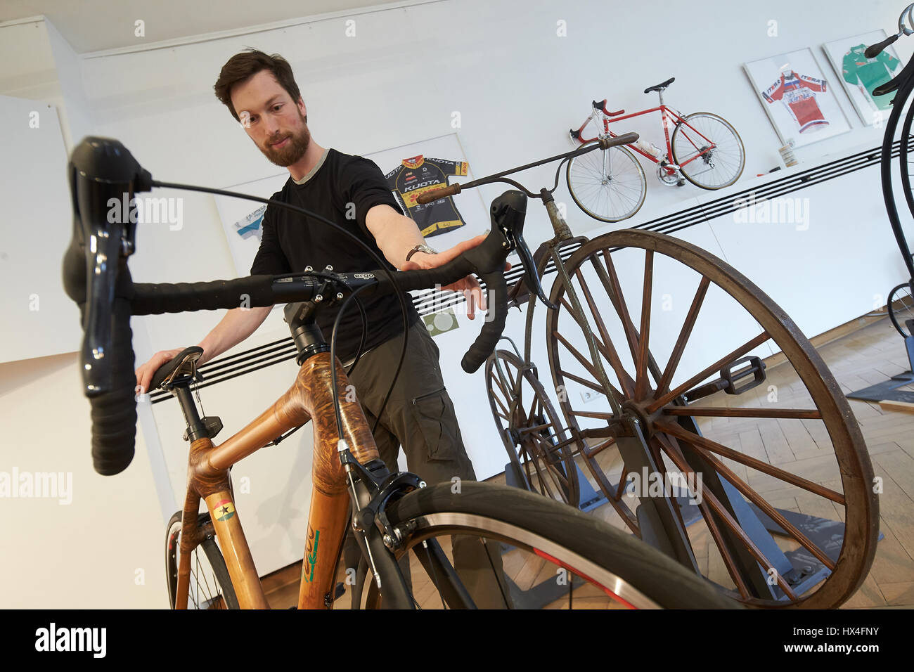 Koblenz, Germany. 20th Mar, 2017. A racing bicycle made from bamboo stands next to historical bikes in the exhibition 'Das Fahrrad - 200 Jahre Handwerk auf Raedern' (lit. The bicycle - 200 years of handicraft on wheels) in Koblenz, Germany, 20 March 2017. The special exhibition marking the 200th birthday of the bicycle will feature some 45 bikes until 07 April. Photo: Thomas Frey/dpa/Alamy Live News Stock Photo