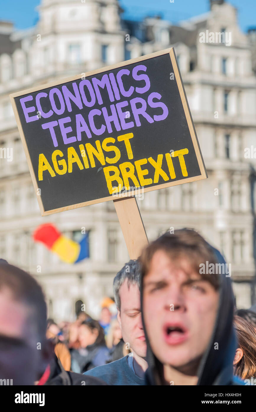 London, UK. 25th Mar, 2017. Economics teachers against Brexit - Unite for Europe march attended by thousands on the weekend before Theresa May triggers article 50. The march went from Park Lane via Whitehall and concluded with speeches in Parliament Square. London 25 Mar 2017 Credit: Guy Bell/Alamy Live News Stock Photo