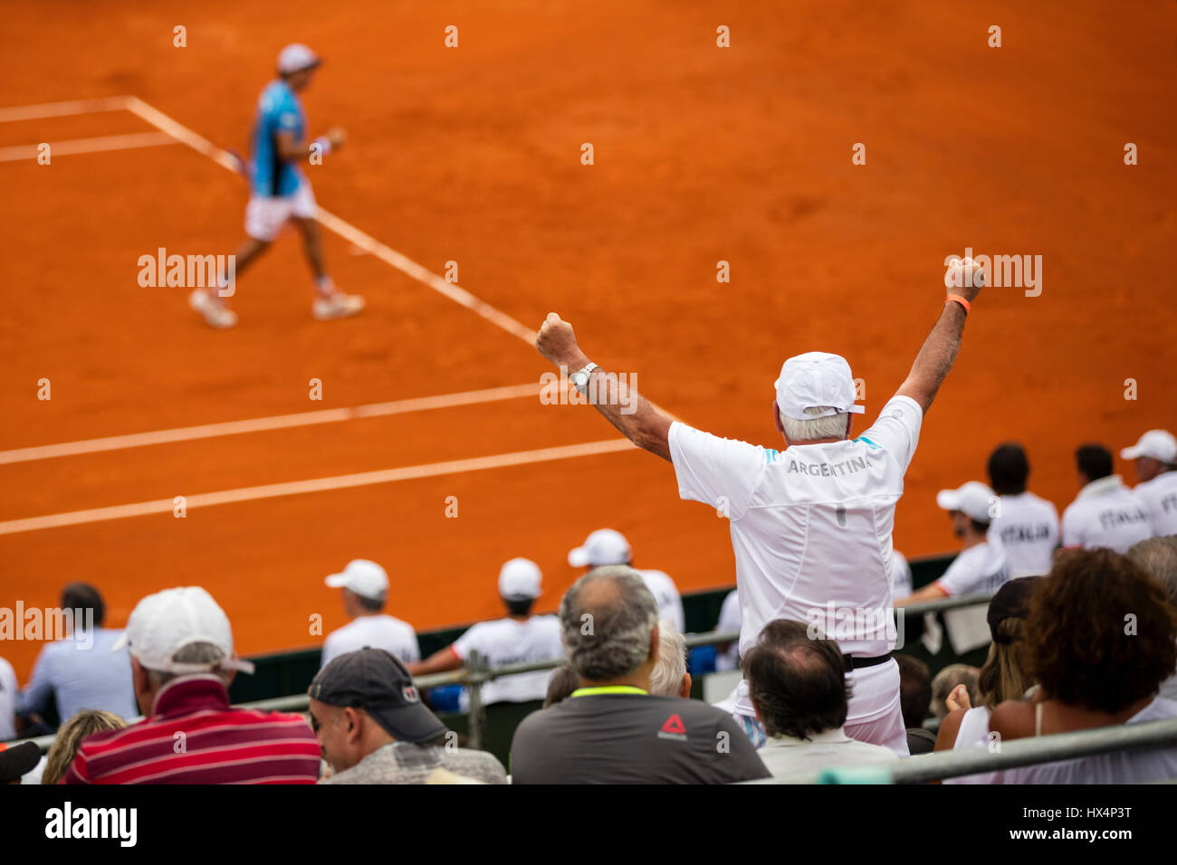 A fan cheers during a Davis Cup match between Argentina and Italy. Parque Sarmiento, Buenos Aires, Argentina. Stock Photo