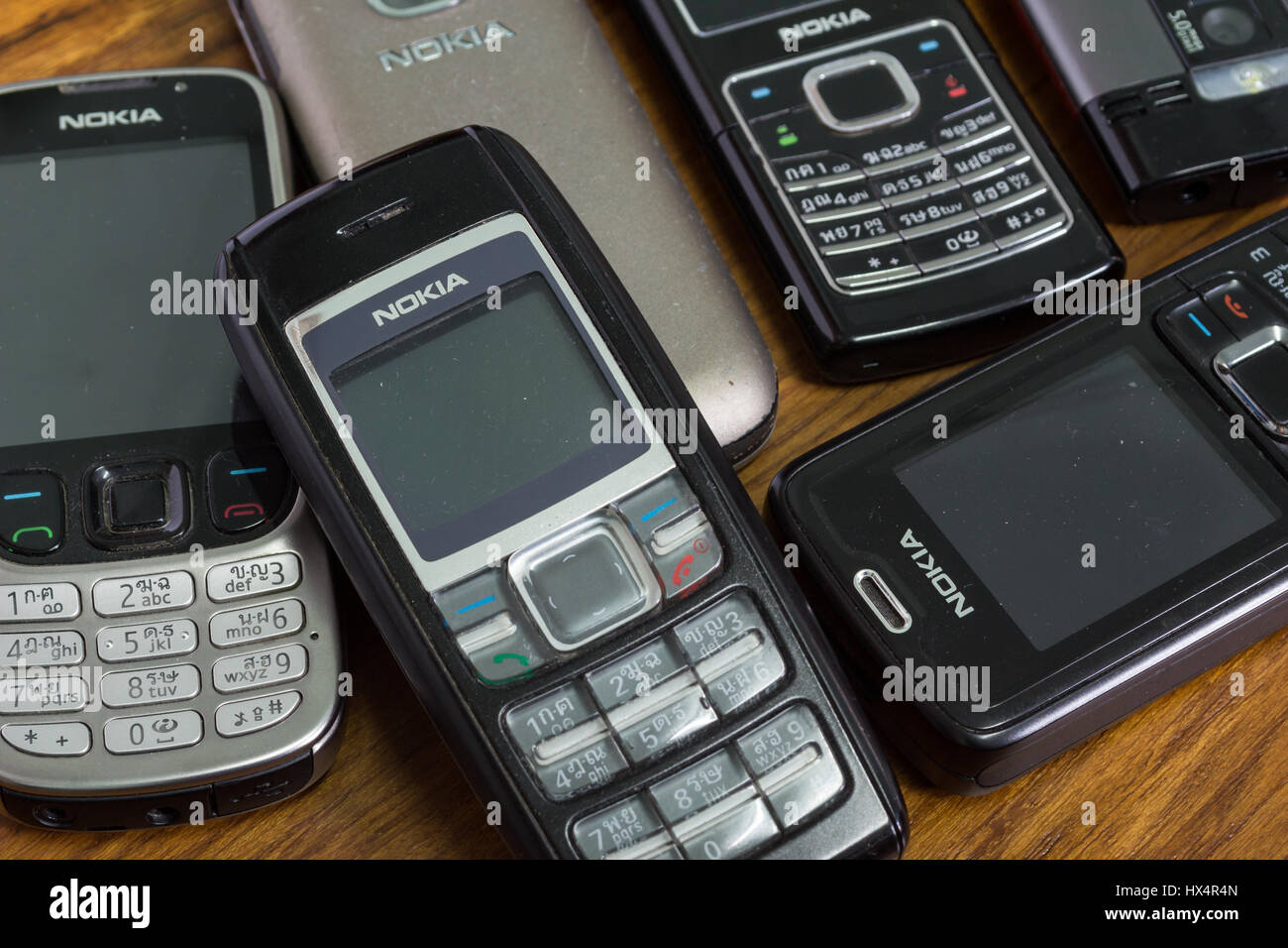 Bangkok, Thailand - March 24, 2017 : Nokia mobile phones on wooden background. Stock Photo