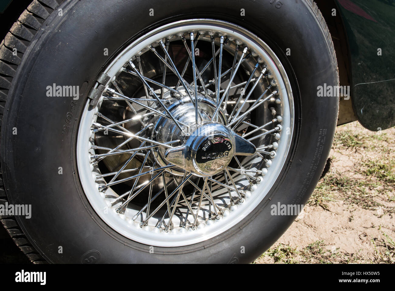 Wire Wheel on a 1950's C Type Jaguar racing Car. Stock Photo
