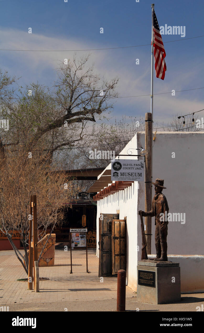 Old El Paso County Jail with Billy the Kid Monument in Foreground, San Elizario Art District, Texas Stock Photo