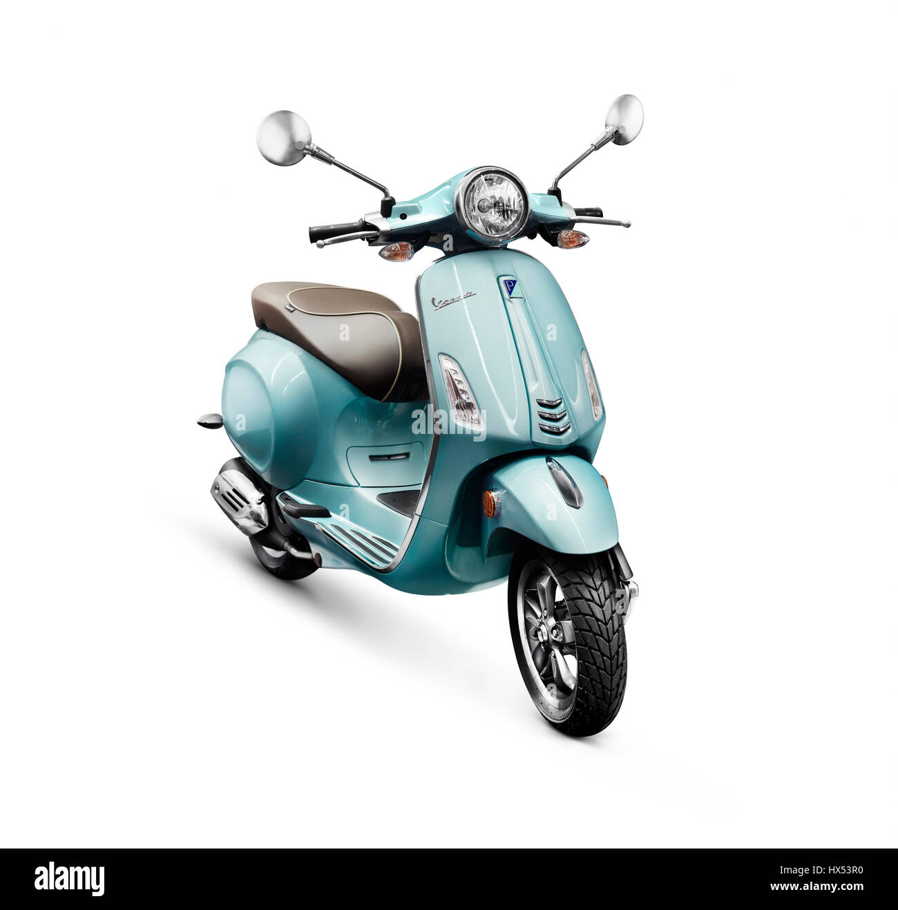 Blue 2017 motor scooter Vespa manufactured by Piaggio isolated on white background with clipping path Stock Photo