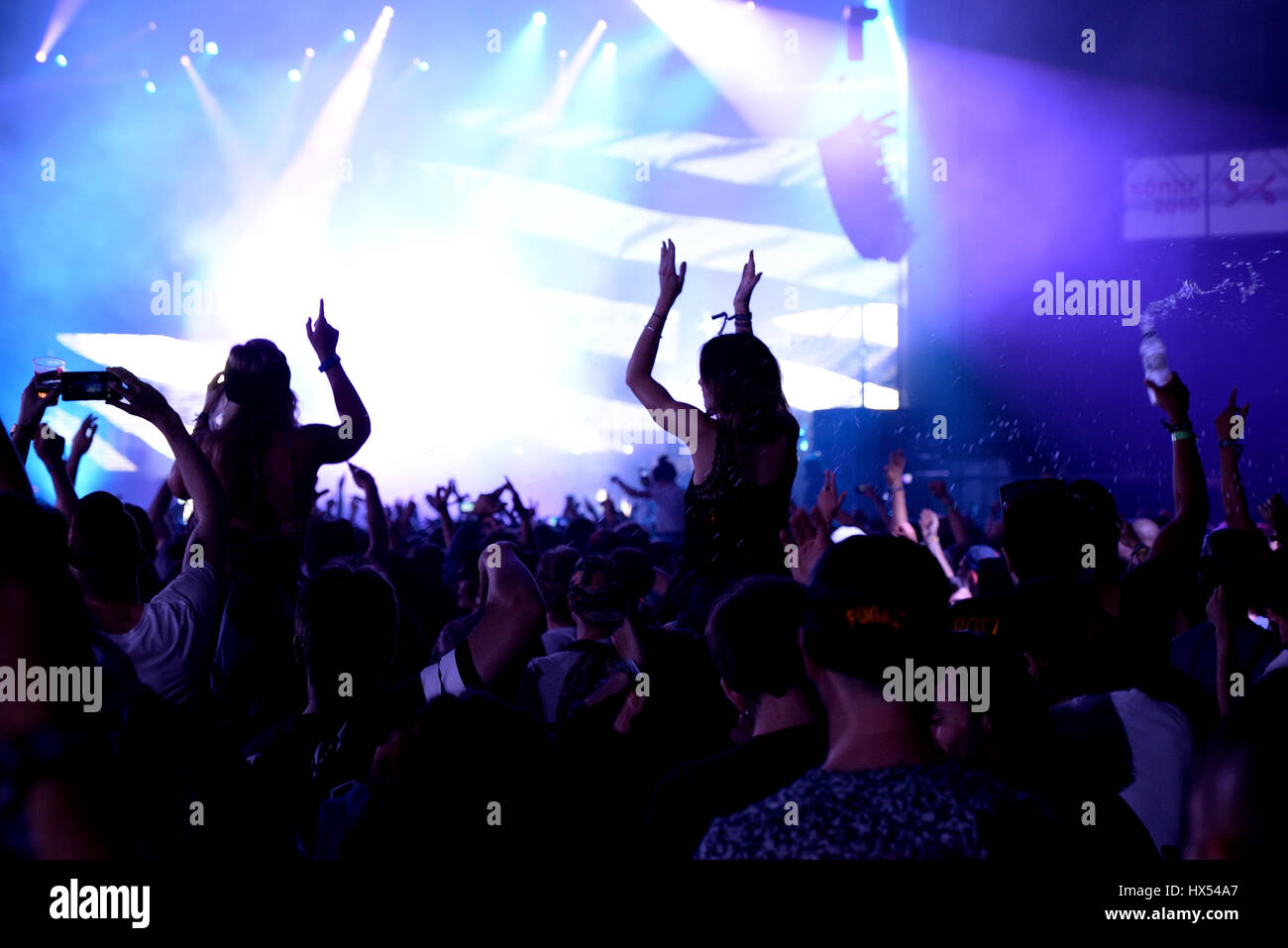 BARCELONA - JUN 19: Crowd dance in a concert at Sonar Festival on June 19, 2015 in Barcelona, Spain. Stock Photo