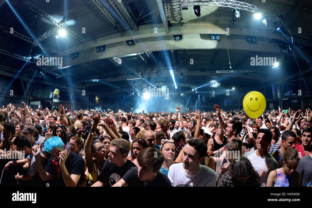 BARCELONA - JUN 19: Crowd dance in a concert at Sonar Festival on June 19, 2015 in Barcelona, Spain. Stock Photo