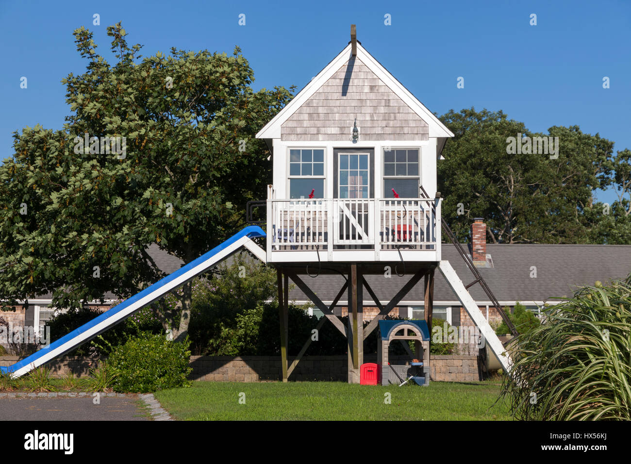 Children's playhouse in a suburban yard. Stock Photo