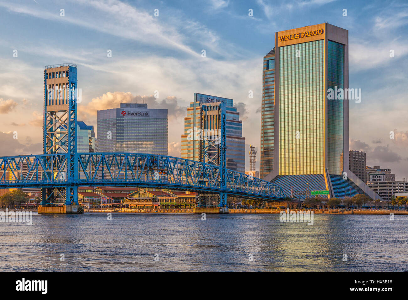 Sunset on downtown buildings and bridges on St Johns River in downtown