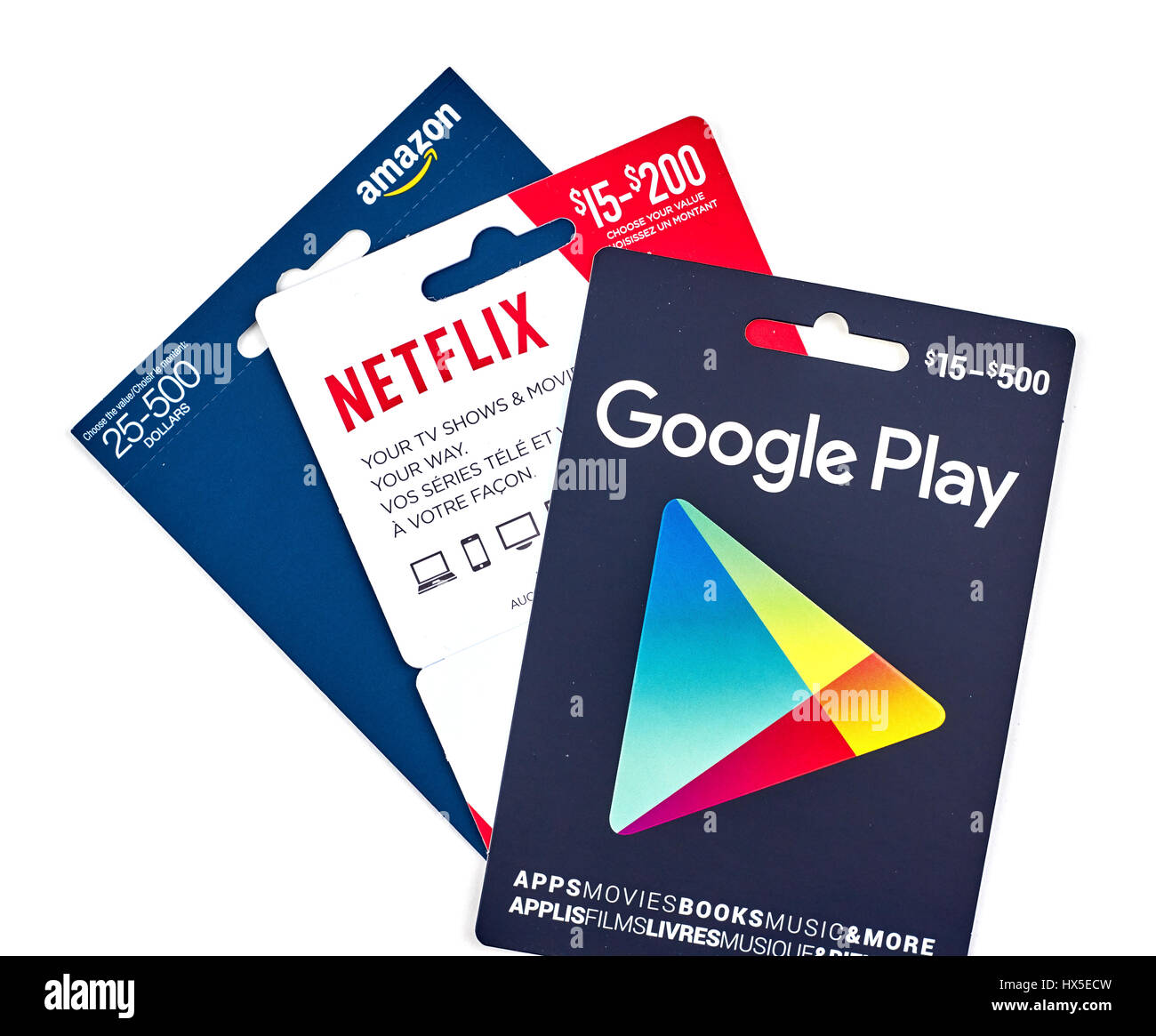 MONTREAL, CANADA - MARCH 10, 2017 : Google Play, Netflix and Amazon popular giftcards. The cards are prepaid stored-value money cards issued to be use Stock Photo