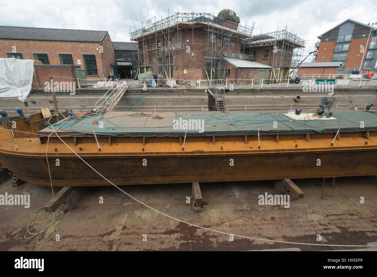 Work in progress on repairing and restoring unpowered barge Sabrina 5
