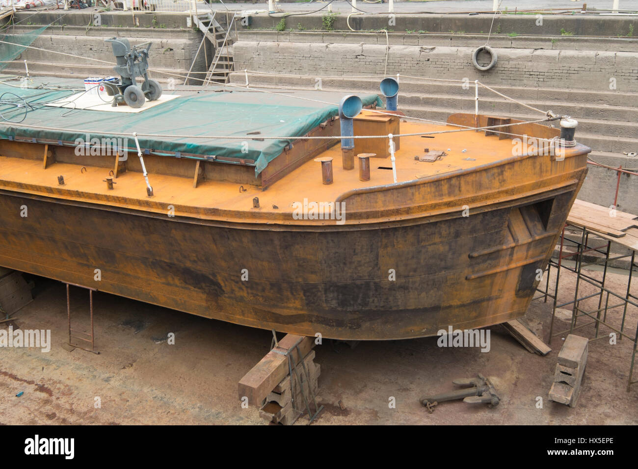Work in progress on repairing and restoring unpowered barge Sabrina 5