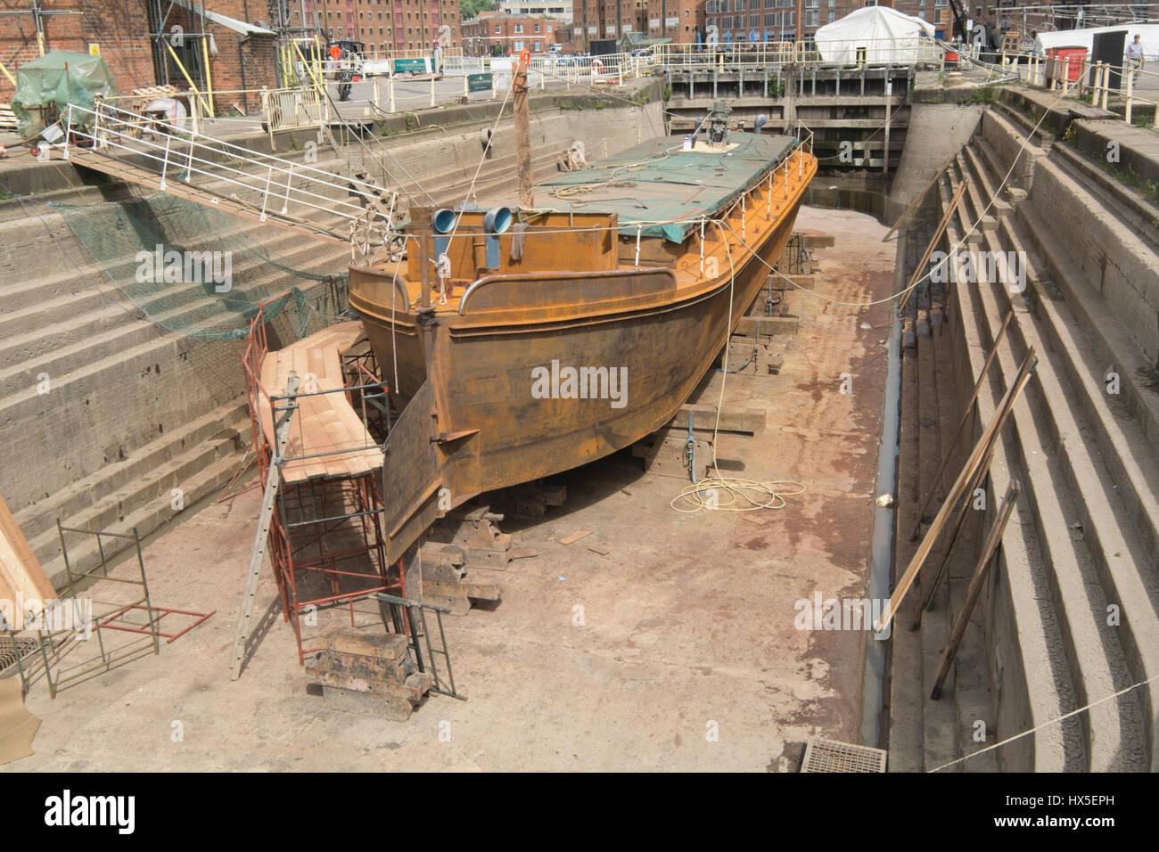 Work in progress on repairing and restoring unpowered barge Sabrina 5