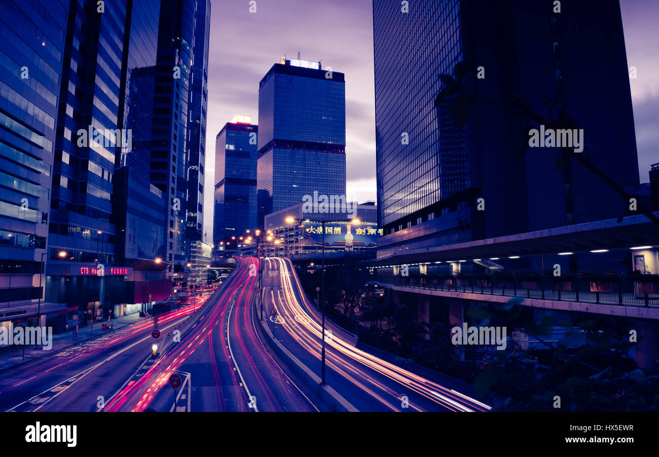 Traffic light-trails through Hong Kong's financial district Stock Photo