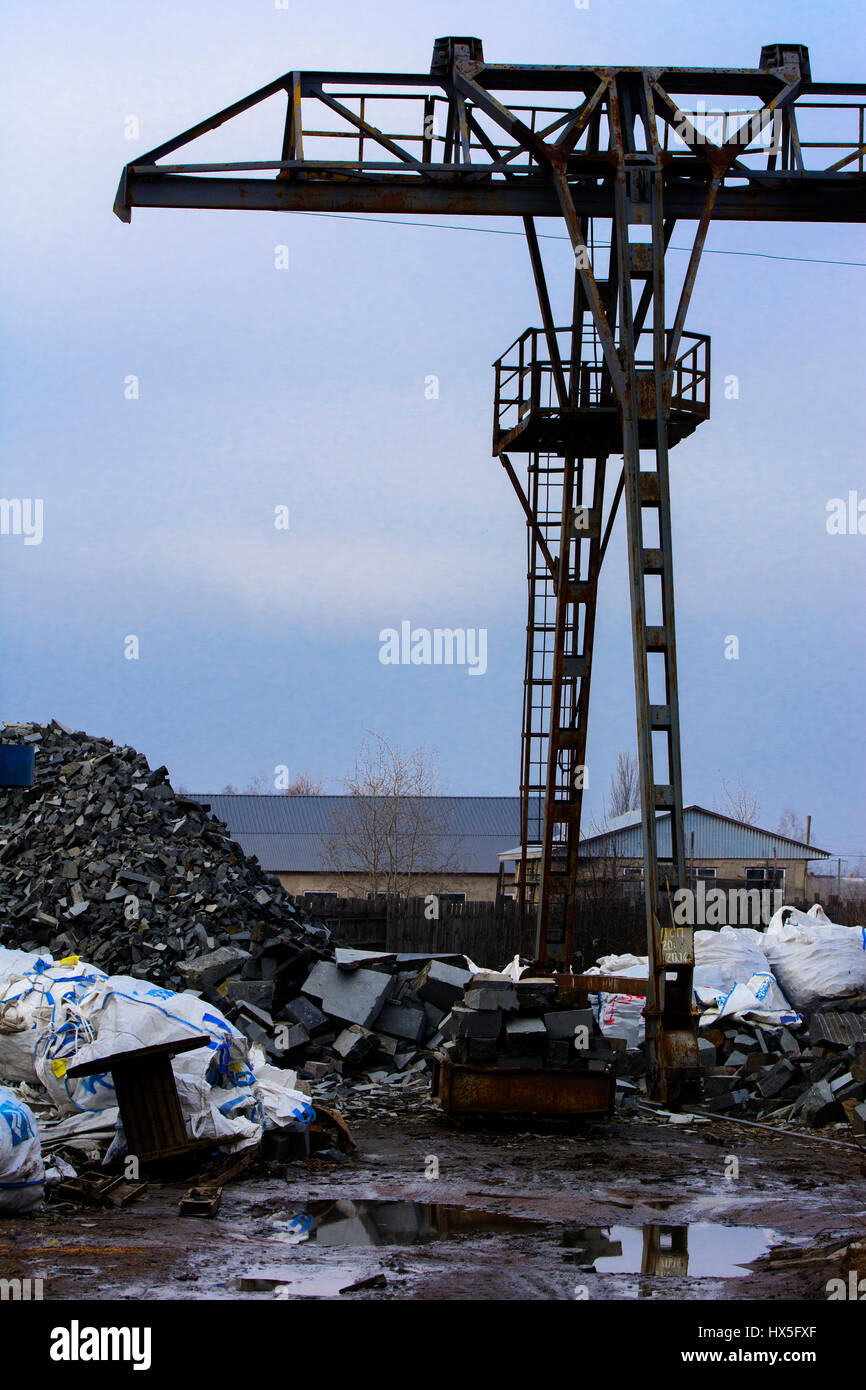 Crane on the production of granite products near the stone processing