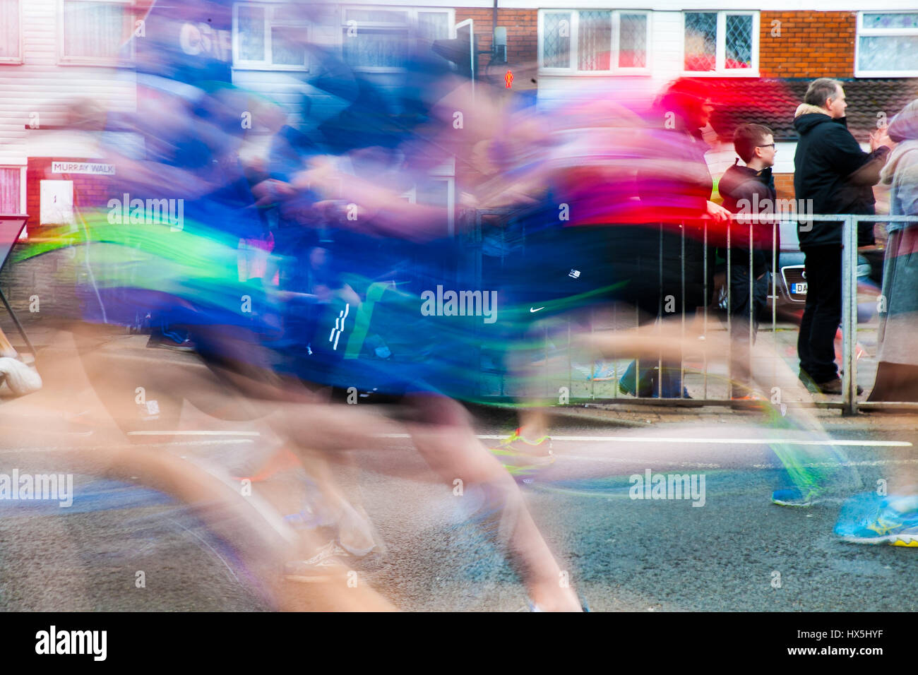 Slow shutter speed shot of people taking part in The World Half Marathon, Cardiff, UK, 26th March 2016 Stock Photo